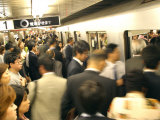 Commuters Boarding Train During 8Am Rush Hour at Ueno Station, Ginza Line, Tokyo, Japan
