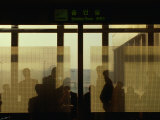Buy People Silhouetted in Smoking Room at Gimpo Airport, Seoul, South Korea at AllPosters.com