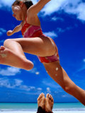 Buy Girl Jumping Dad's Legs, Seychelles at AllPosters.com
