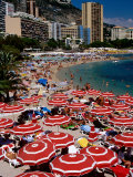 Overhead of Red Sun Umbrellas at Larvotto Beach on Busy Summer's Day, Monte Carlo, Monaco