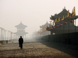 Man Walking on Ancient Wall Near North Gate, Xi'An, China
