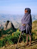 Shepherd Boy with Simien Mountains Background, Simien Mountains National Park, Ethiopia