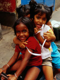 Buy Portrait of Children Sitting on Motorbike, Chowringee, India at AllPosters.com