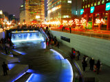 Buy The Cheonggyecheon Stream Draws Crowds of Locals out in Early Evening, Seoul, South Korea at AllPosters.com
