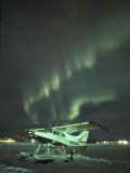 Buy Northern Lights Illuminate a Snow-Covered Maule M-5, Fairbanks, Alaska, USA at AllPosters.com