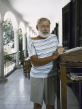 Ernest Hemingway at the Standing Desk on the Balcony of Bill Davis's Home Near Malaga