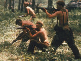 American Soldiers Firing at Enemy Troops Somewhere Along the South Vietnamese Cambodian Border Area