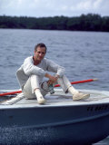Actor Paul Newman Enjoying a Heineken Beer on the Prow of a Boat Premium Photographic Print