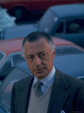 Buy President of Fiat Gianni Agnelli Standing with Cars in Background at AllPosters.com