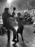Pop Singer Chubby Checker Singing His Hit Song "The Twist" at the Crescendo Nightclub