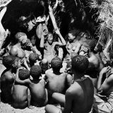 Buy Chief Acts Out a Story to Bushman Children, Southern Kalahari Desert in Central Southern Africa at AllPosters.com