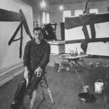 Abstract Expressionist Painter Franz Kline Perching on Stool in His Studio