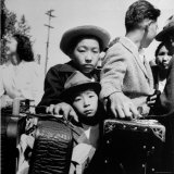Buy Evacuees of Japan Awaiting Turn for Baggage Inspection upon Arrival at Assembly Center During WWII at AllPosters.com