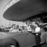 Buy Women and Girls, in Convertible at Drive In, Greet Female Car Hop, Who Just Brought Their Drinks at AllPosters.com