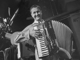 Entertainer Lawrence Welk Playing His Accordion on His Weekly TV Show