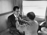 Life Photographer Alfred Eisenstaedt fix Presidential Candidate Richard Nixon's Tie During Campaign