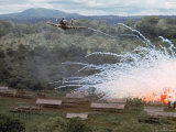 Village in flames after Explosives Dropped During an American Air Strike Against Viet Cong