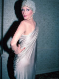 Buy Actress Morgan Fairchild, Wearing Silver Dress and Mesh Hat at AllPosters.com