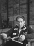 Buy Actor Alec Guinness Sporting Natural Looking Toupee, While Sitting on Movie Set with a Book at AllPosters.com