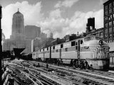 Buy New York Central Passenger Train with a Streamlined Locomotive Leaving Chicago Station at AllPosters.com
