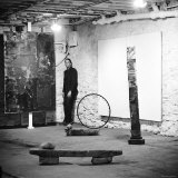 Robert Rauschenberg Standing in Corner of His Studio, Among His Other Paintings and Sculptures