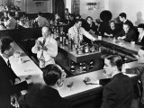 Bartender Prepares a Drink as Patrons Enjoy Themselves at Popular Speakeasy during Prohibition
