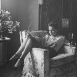 Actress Olivia de Havilland with Cigarette and Glass of Beer in While Relaxing at Home
