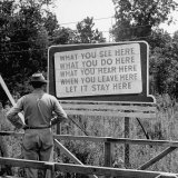 WWII Era Billboard at Oak Ridge Facility Warn Workers to Keep silent of anything seen or Heard here