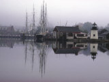 Buy Scenic Harbor View with Masted Ships and Buildings Reflected in Placid Waters at Mystic Seaport at AllPosters.com