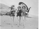 Frolicsome Trio of American Bathing Beauties Wearing the Latest Swimsuit Costumes