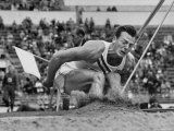 Robert B. Mathias Grimacing with the Effort of His 22 Foot 11 Inch Leap at 1952 Olympics