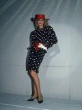 Model Jerry Hall Displaying an Outfit During a Fashion Show