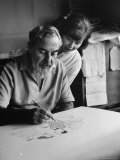 Cartoonist of American Theater Personalities Al Hirschfeld Working on a Group of Caricatures