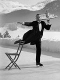 Buy Waiter Rene Brequet with Tray of Cocktails as He Skates Around Serving Patrons at the Grand Hotel at AllPosters.com