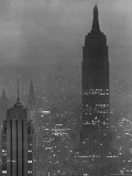 Buy Silhouette of the Empire State Building and Other Buildings without Light During Wartime at AllPosters.com
