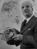 American Engineer and Architect Buckminster Fuller Holding a Globe