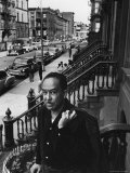 African American Poet/Writer Langston Hughes Standing on the Stoop in Front of His House in Harlem