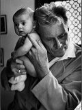 Blind Doctor Albert A. Nast Holding Ear to Back of 3 Month Old Instead of Using a Stethoscope