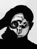 Photographer Dennis Stock Holding Camera to His Face
