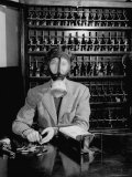 Pictures from Money Making Company Brink's Incorporated with Employee Posing in a Gas Mask
