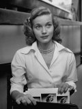 Actress Eva Maria Saint, Taking Her Portraits and Calling Cards from Her Briefcase