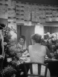 Actress Geraldine Page backstage of "Midsummer" surrounded by telegrams and flowers
