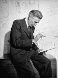 Cartoonist James Thurber Posing with His Work