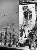 Billboard in the Piazza Del Duomo features Abbott and Costello, Whom Italians Call Cianni E Pinotto