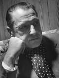 Author Somerset Maugham Sitting on Couch and Leaning Head on Knuckles
