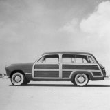 New Ford Sedan, Seating 8 People, with All Steel Body to Which Wood Paneling Bolted