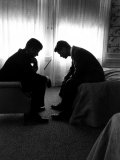 Jack Kennedy Conferring with His Brother and Campaign Organizer Bobby Kennedy in Hotel Suite