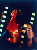 Film Director Quentin Tarantino Framed by Projected Clip From His Movie 