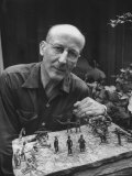 Editor and Author Bruce Catton Sitting Behind Stone Block Containing Miniature Civil War Figurines