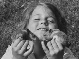 Shelley Silk, Daughter of Photographer George Silk, Ecstatically Cuddling Her Two Pet Hamsters